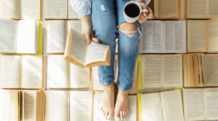 woman reading book with coffee; book club 2022